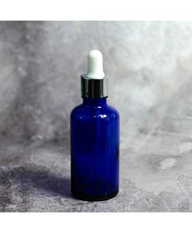 Cosmetic blue glass bottle 30 ml with  silver dropper